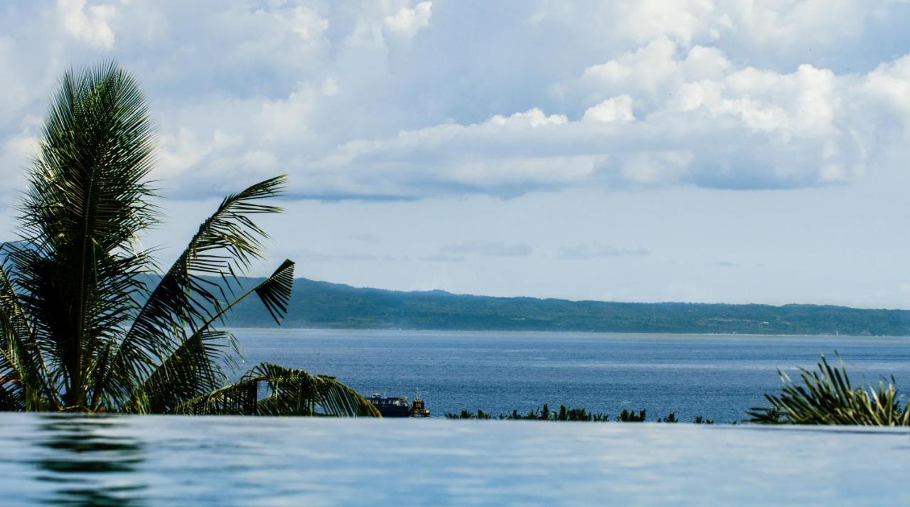 Neano Escape Hotel Manggis Exterior foto View of the Gulf of Davao