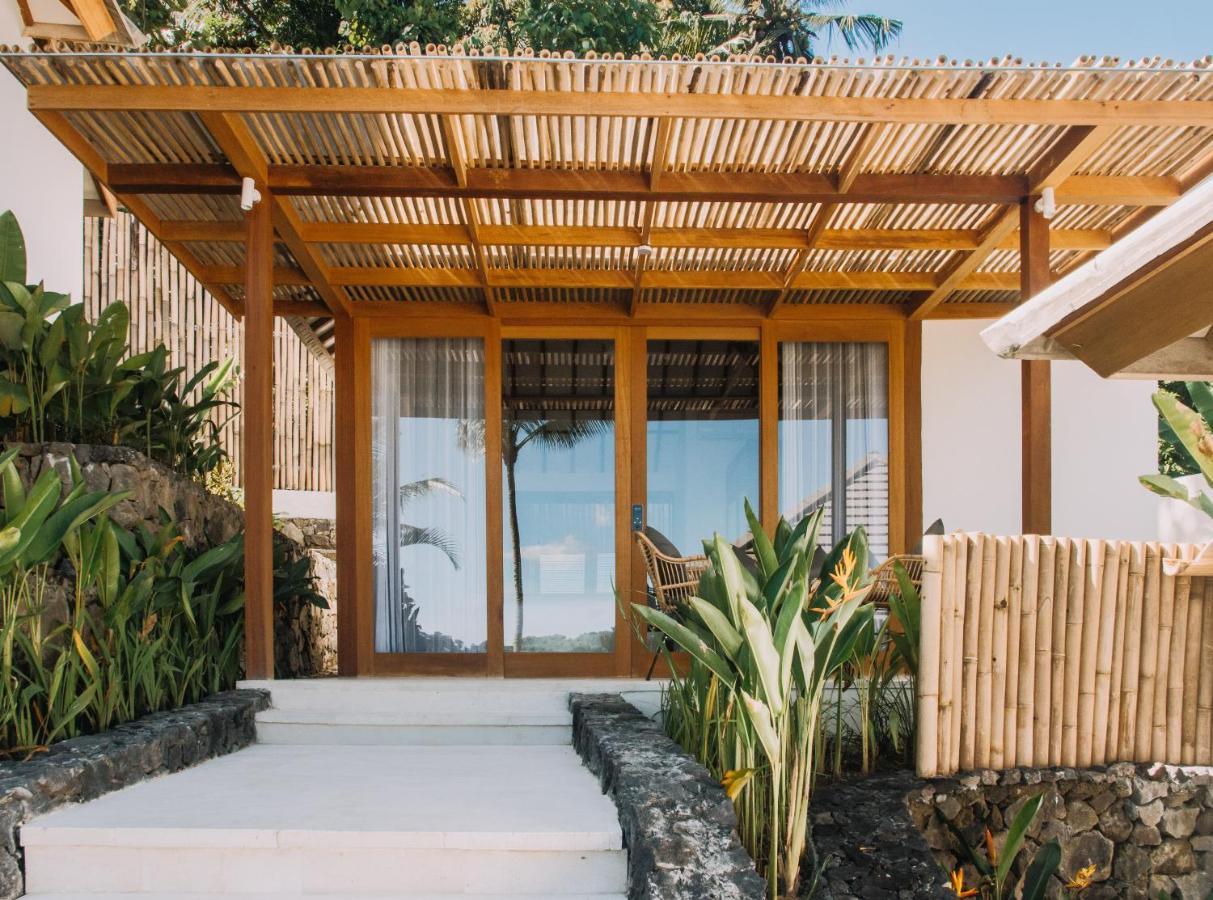 Neano Escape Hotel Manggis Exterior foto A villa at the resort