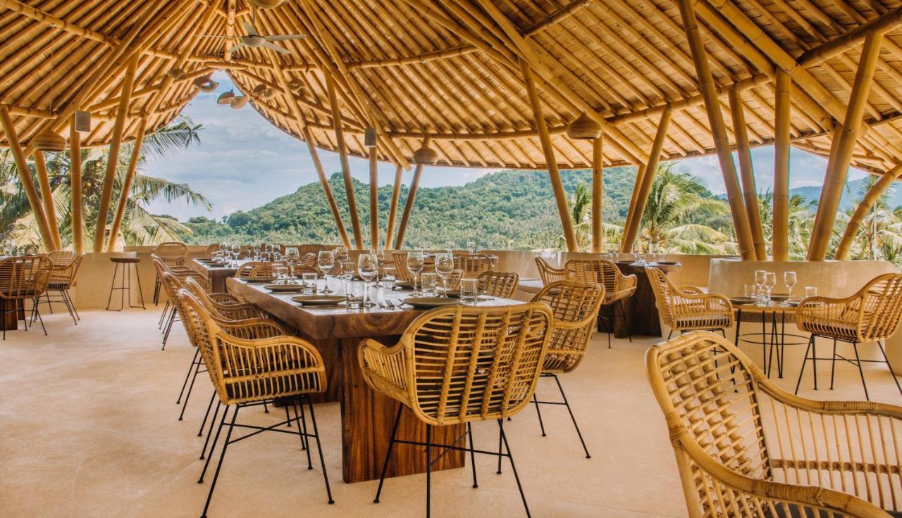 Neano Escape Hotel Manggis Exterior foto The restaurant at the resort