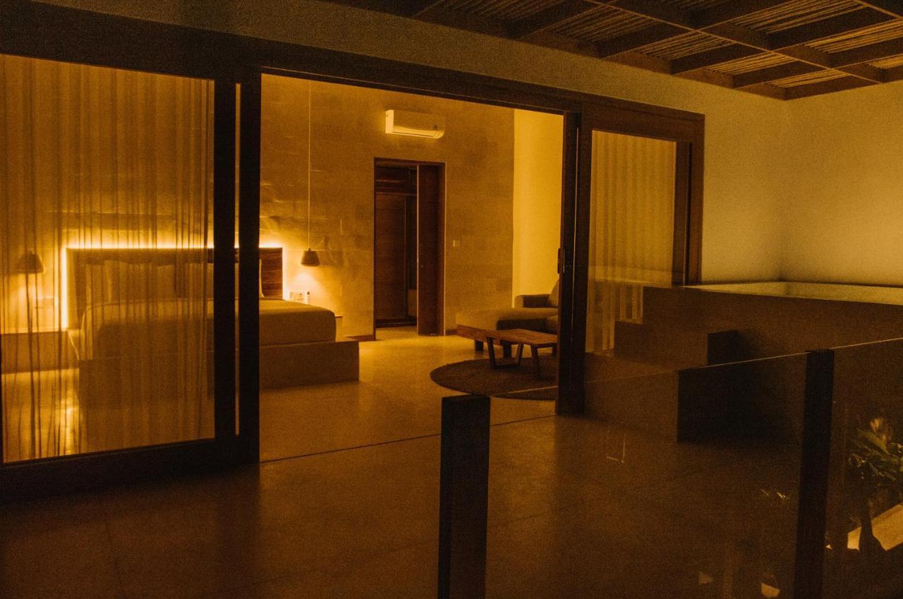 Neano Escape Hotel Manggis Exterior foto A room at the Taj Mahal Palace
